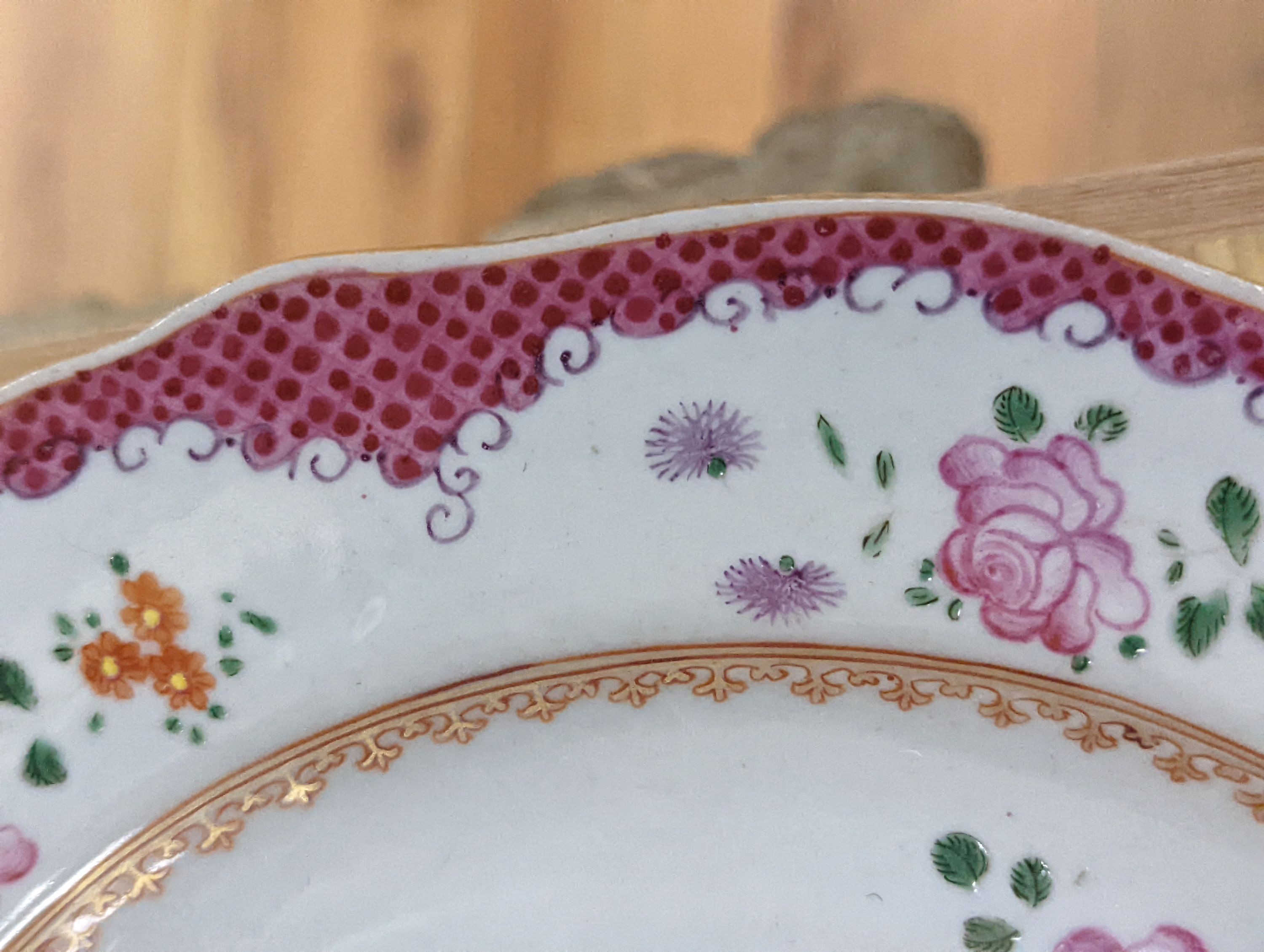 Two pairs of 18th century Chinese famille rose plates and an Imari plate, 26cm